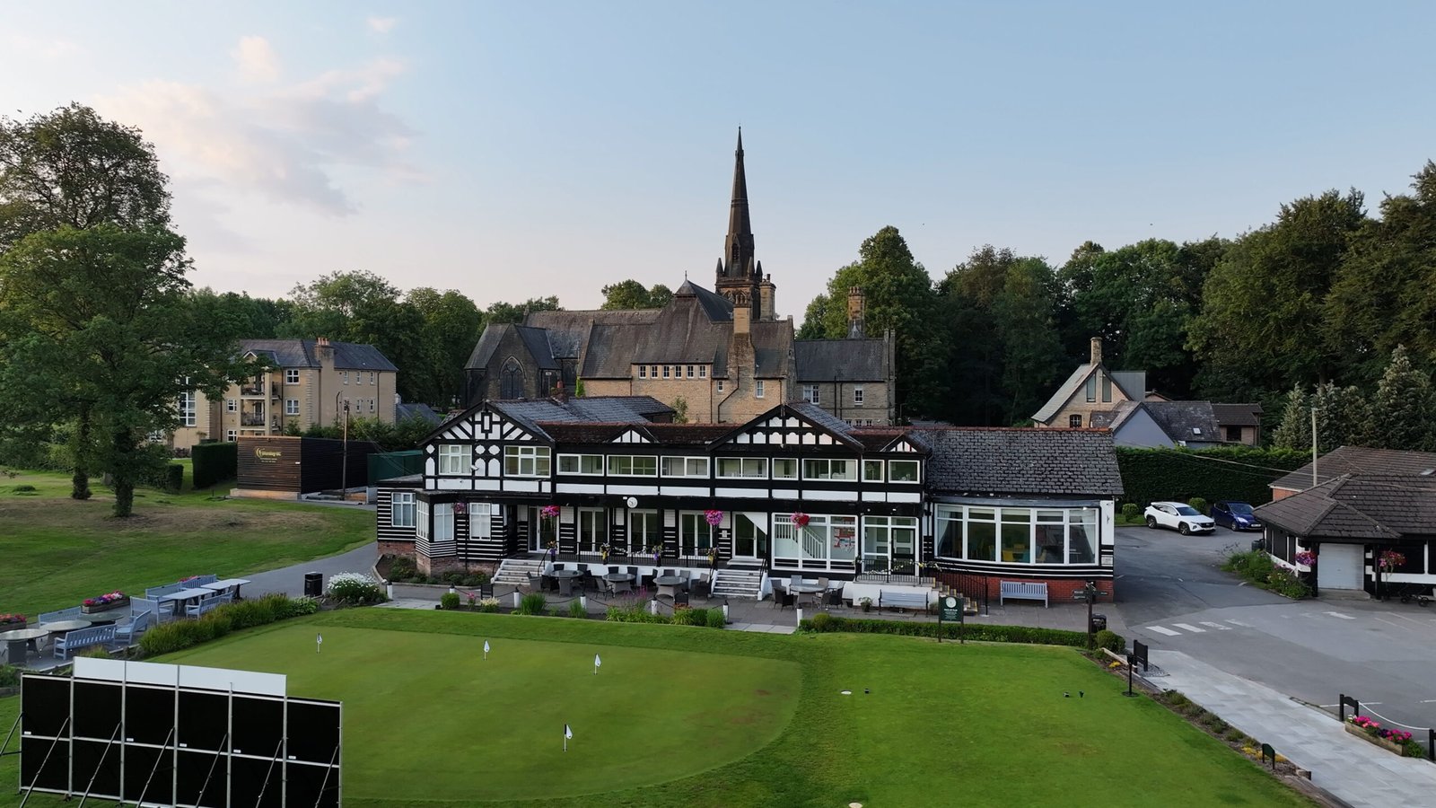 Wide-angle drone view of clubhouse at Worsley Golf Club
